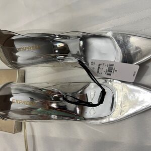 Brand new silver high heels